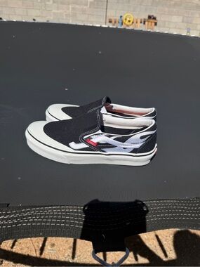 Women size 8 Vans Black and White Flame Slip-On Sneakers